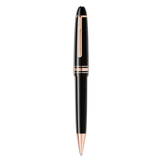 Presenting the Montblanc Meisterstück Black Resin Rose Plated Ballpoint Pen, a sophisticated writing instrument made from precious black resin with a glossy finish. This luxurious pen features rose gold plated clip and trim, complemented by its smooth, polished body and pointed tip. Set vertically against a white background, it embodies the elegance of Meisterstück artistry from the esteemed Montblanc brand.