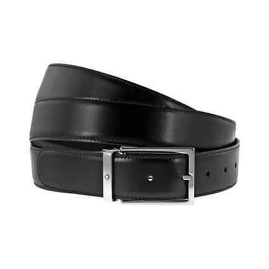 A Montblanc reversible smooth black/brown leather belt with a polished palladium-coated buckle, coiled neatly on a white background.