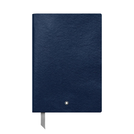 A closed Montblanc Indigo Lined Notebook in Saffiano leather showcases a silver round emblem at the bottom center with a ribbon bookmark peeking out. Crafted with high-quality paper, it embodies the sophistication of Montblanc Fine Stationery.