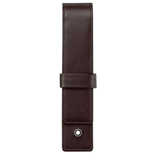A sophisticated Montblanc Meisterstück Brown Leather Pen Pouch crafted from dark brown European full-grain cowhide, featuring a convenient flap closure. This elegant accessory is accentuated by a small circular white emblem near the bottom, making it perfect for any writing instrument.