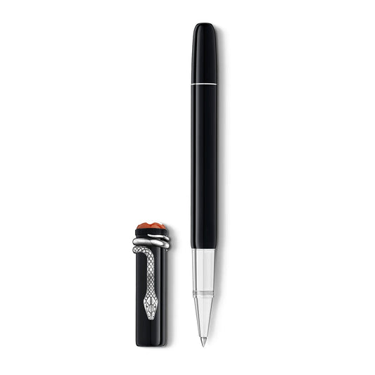 The Montblanc Heritage Collection Rouge & Noir Special Edition Black Resin Platinum Plated Rollerball Pen is elegantly displayed vertically against a white background. The pen, sleek and black with a platinum-plated tip, is shown next to its cap. The cap features intricate detailing, including a silver snake wrapped around it and a red accent on top.