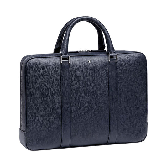 The Montblanc Meisterstuck Slim Blue Soft Grain Leather Document Case combines a sleek and minimalist design with soft-grain leather in an elegant blue hue. It features two sturdy handles, a laptop compartment, a removable shoulder strap, and a central zipper. Subtle stitching lines add an extra touch of sophistication to its overall appearance.