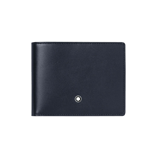 The Montblanc Meisterstuck Leather Wallet 6cc boasts a sleek, modern design with black leather and a small, round emblem featuring a star on the front. Positioned closed against a plain white background, this wallet is an essential item for any contemporary wardrobe.