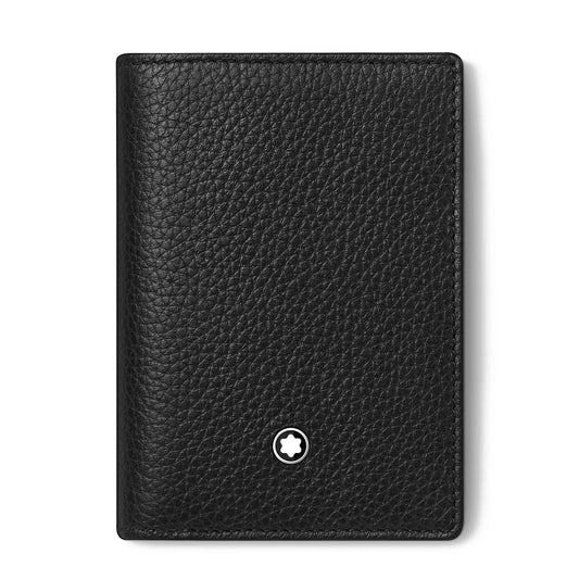 The Montblanc Meisterstuck Soft Grain Leather Business Card Holder with Bill Compartment from Montblanc is a sleek black holder that features a textured surface and a convenient bill compartment. The cover includes a small, circular emblem in the lower center, adorned with a white star outlined in black. Crafted from soft grained leather, this design is both simple and elegant.