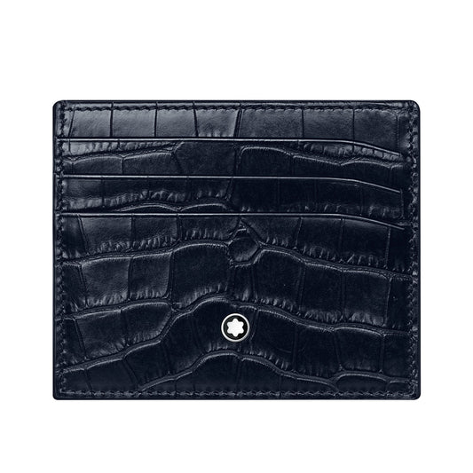 The Montblanc Meisterstück Meisterstück Black Leather Wallet is crafted from black crocodile-patterned leather and includes multiple card slots. It features a small, round emblem with a star in the center. The glossy and detailed texture stands out against a plain white background.
