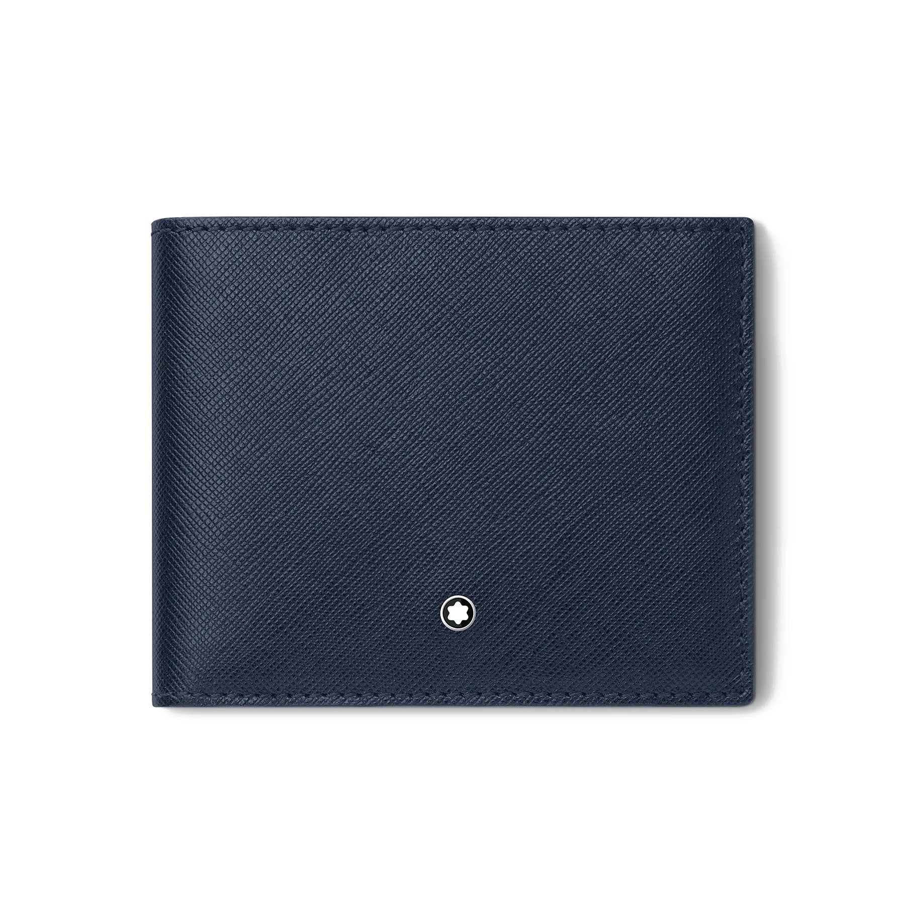 This refined piece, the Montblanc Sartorial Leather Wallet 6cc, is crafted from elegant navy blue leather and features a minimalist design. Part of the esteemed Montblanc brand, it boasts a small white emblem at the bottom center. Pictured closed against a plain white background, it exudes sophistication.