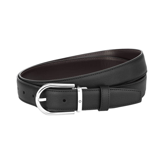 The Montblanc Horseshoe Leather Belt is made from reversible leather, showcasing a shiny silver buckle with a palladium finish, artfully arranged in a circular shape against a white background.