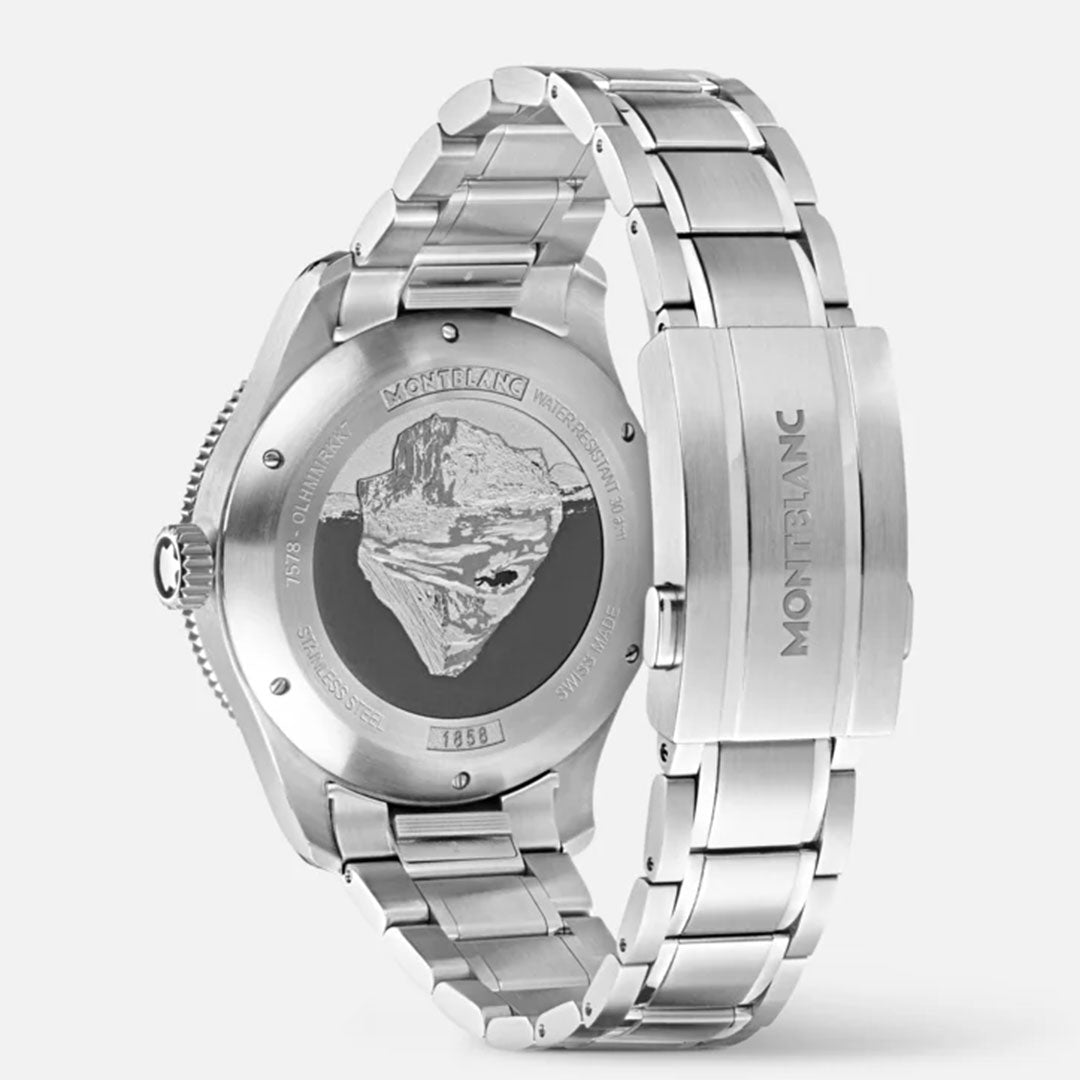 The Montblanc Iced Sea Automatic 41mm Watch is displayed with a silver metal bracelet. The back is adorned with an engraved mountain design and inscriptions around the edge, while "Montblanc" is engraved on the clasp. The glacier pattern dial enhances the uniqueness of this sports diving watch.
