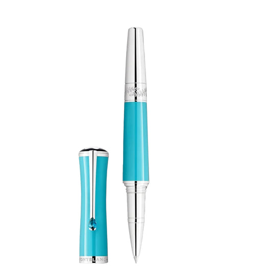 The Montblanc Muses Maria Callas Special Edition Rollerball Pen presents a luxurious turquoise finish, inspired by the iconic opera singer. It features a silver cap and detailed design, with the cap placed beside the pen to highlight its sleek appearance and glossy finish.