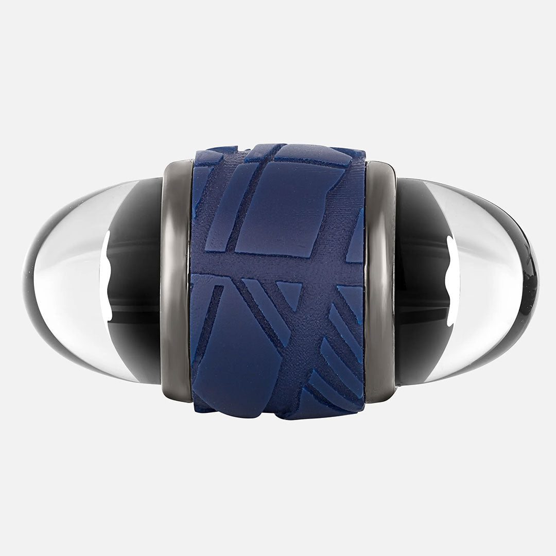 These Montblanc Starwalker Blue Stainless Steel and Lacquer Cufflinks feature clear rounded ends and a textured dark blue band with geometric patterns at the center, presented against a plain light gray background.