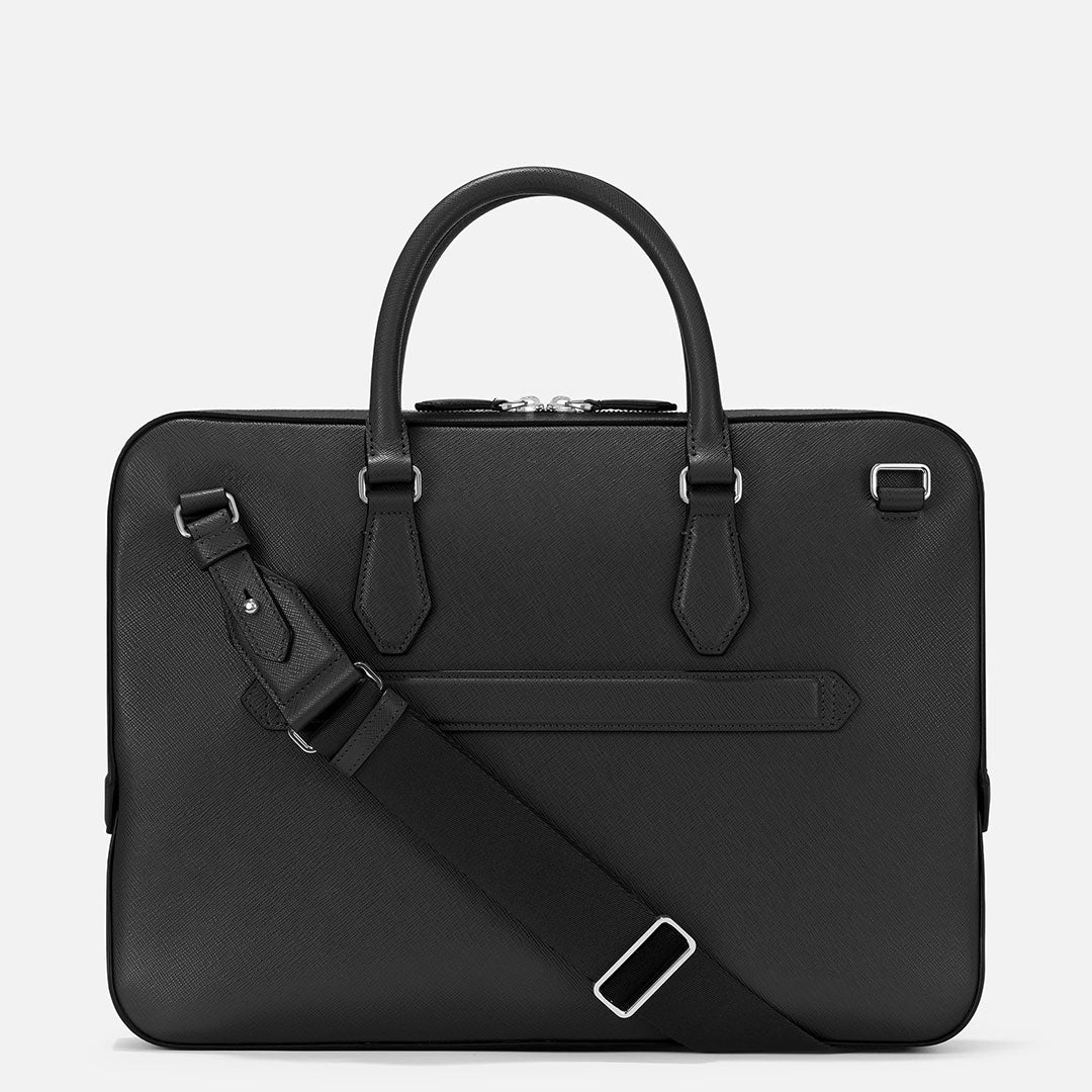 The Montblanc Sartorial Thin Leather Document Case Bag is a minimalist leather case with two handles, an adjustable removable shoulder strap, silver hardware, and refined elegance—shown on a plain light background.