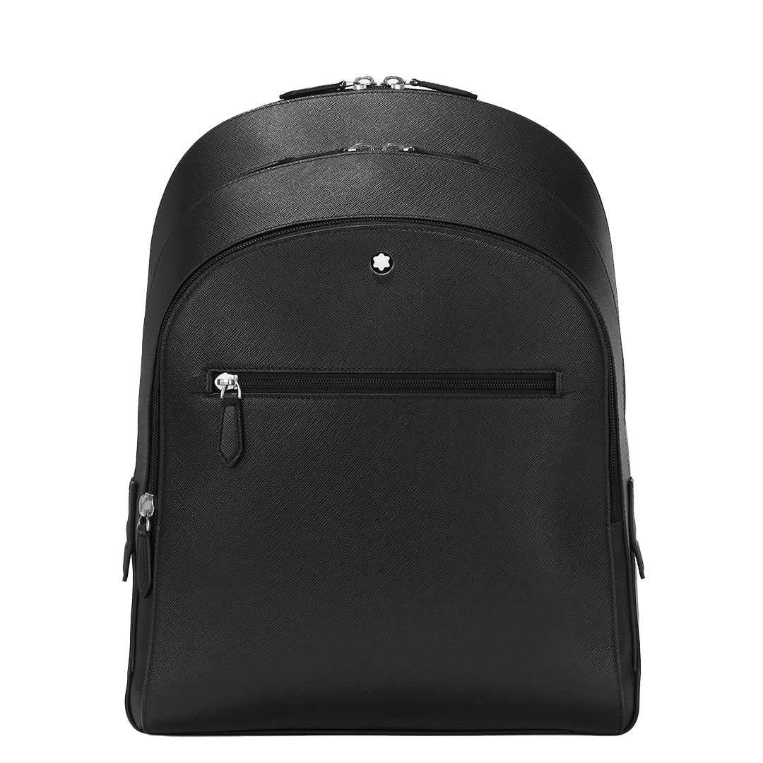 The Montblanc Sartorial Medium 3 Compartments Leather Backpack Bag features black Saffiano leather, two main zippered compartments, a front zip pocket with a small emblem above, and a sleek, minimalistic design—perfect for city style.