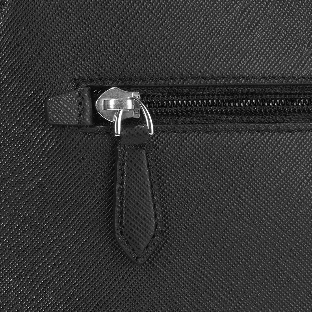 Close-up of the Montblanc Sartorial Medium 3 Compartments Leather Backpack Bag, crafted in black Saffiano leather with a subtle crosshatch texture, silver zipper, and matching leather pull tab—a refined city backpack by Montblanc.