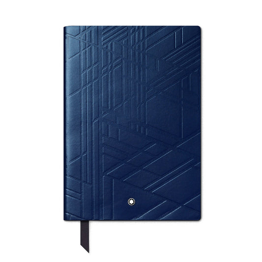 The Montblanc Starwalker Space Blue #146 Small Notebook boasts a sleek design with an embossed geometric pattern on its cover. It features a small, round silver Montblanc logo near the bottom and includes a black ribbon bookmark. The lined pages are ideal for jotting down notes, and the notebook is showcased vertically against a plain white background.