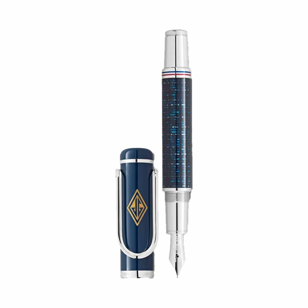 The Montblanc Great Characters Homage to The Great Gatsby Special Edition Fountain Pen features a luxurious blue patterned body with silver accents, capturing the elegance of the Roaring Twenties. Its cap, set adjacent, bears a gold emblem that mirrors the opulence of The Great Gatsby. The prominently featured nib showcases its robust and elegant design.