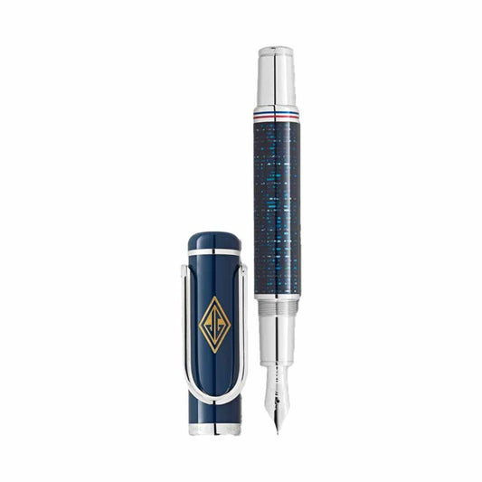 The Montblanc Great Characters Homage to The Great Gatsby Special Edition Fountain Pen features a luxurious blue patterned body with silver accents, capturing the elegance of the Roaring Twenties. Its cap, set adjacent, bears a gold emblem that mirrors the opulence of The Great Gatsby. The prominently featured nib showcases its robust and elegant design.