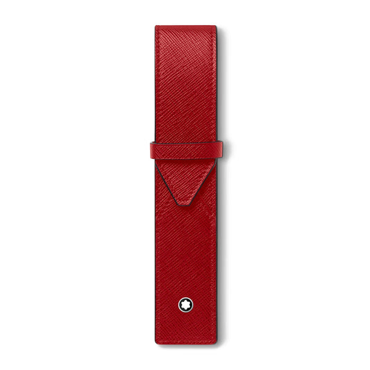 The Montblanc Sartorial Red Leather Pen Pouch is crafted from full-grain leather with a textured surface and envelope silhouette with a flap closure, featuring a circular black and white emblem near the bottom to securely hold one pen.