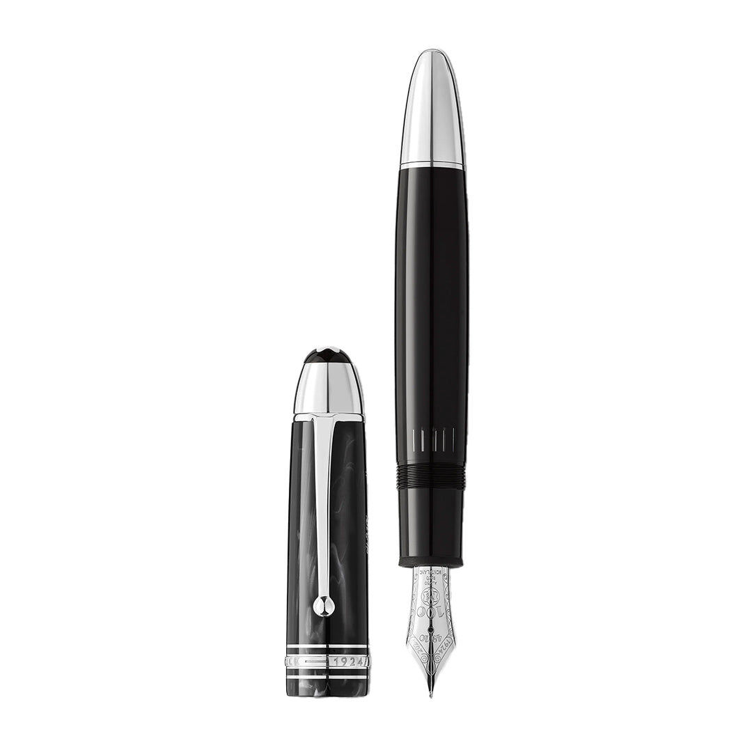The Montblanc Meisterstuck The Original Collection 149 Fountain Pen M is pictured in black with a silver nib and cap beside it, featuring glossy black and silver accents with intricate detailing on the nib.