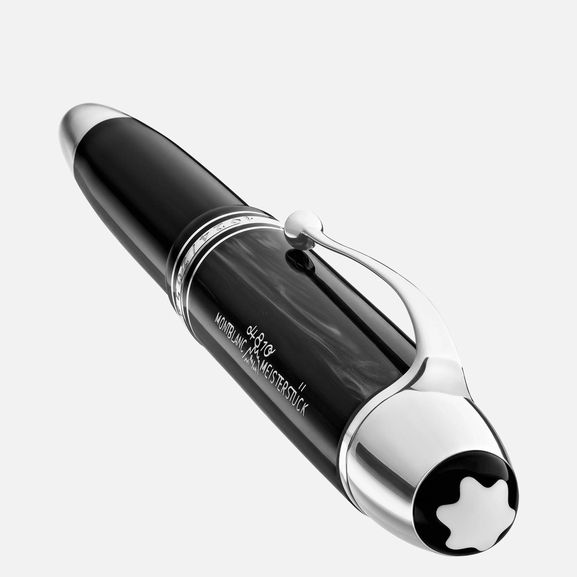 The Montblanc Meisterstuck The Original Collection 149 Fountain Pen M features a luxurious black and silver design with intricate details, elegantly resting on a light surface.