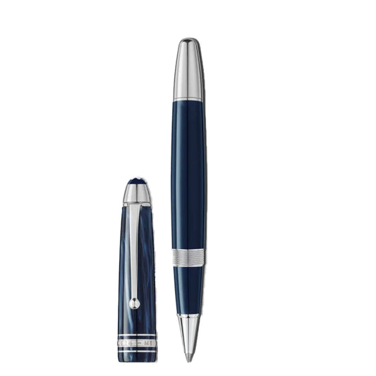 A sleek Montblanc Meisterstuck The Origin Collection Legrand Rollerball Pen in dark blue and silver, with its cap removed. This fine writing instrument features a glossy finish with silver accents, while the cap stands upright beside it, showcasing its polished design.