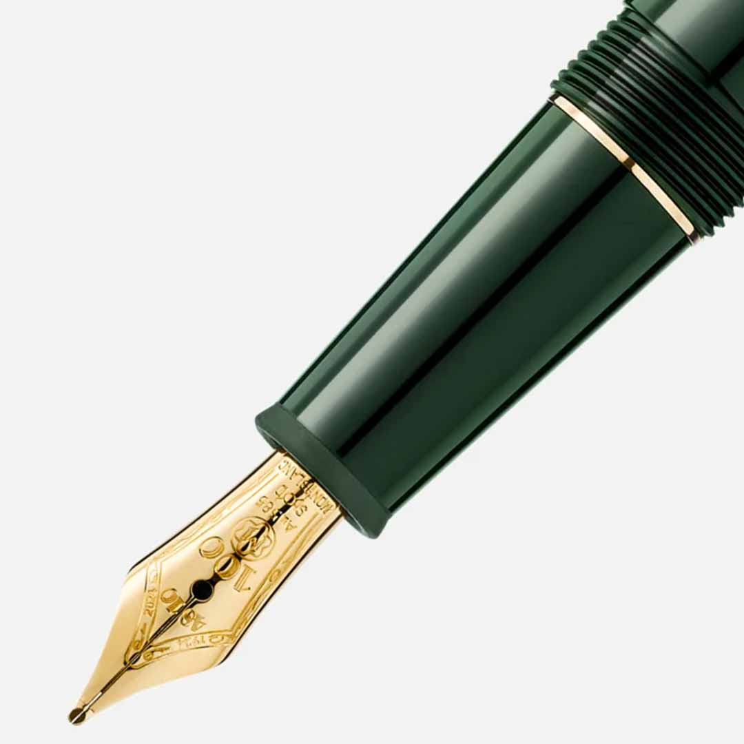 Close-up of a Montblanc Meisterstück The Origin Collection Classique Fountain Pen with a gold nib, featuring ornate detailing. This exquisite writing instrument from Montblanc is angled slightly to the right, highlighting its glossy finish and meticulous craftsmanship against a plain, light background.