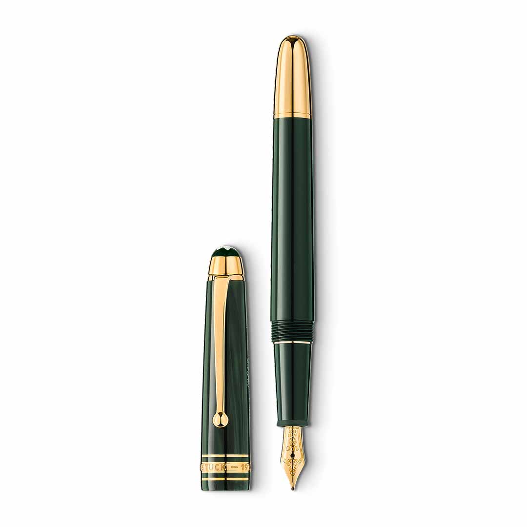 A sleek, Montblanc Meisterstuck The Origin Collection Precious Resin Fountain Pen Classique M in dark green with gold accents is displayed with its cap removed and placed next to the pen. The visible nib highlights the elegant design of this exquisite Montblanc fine writing instrument.