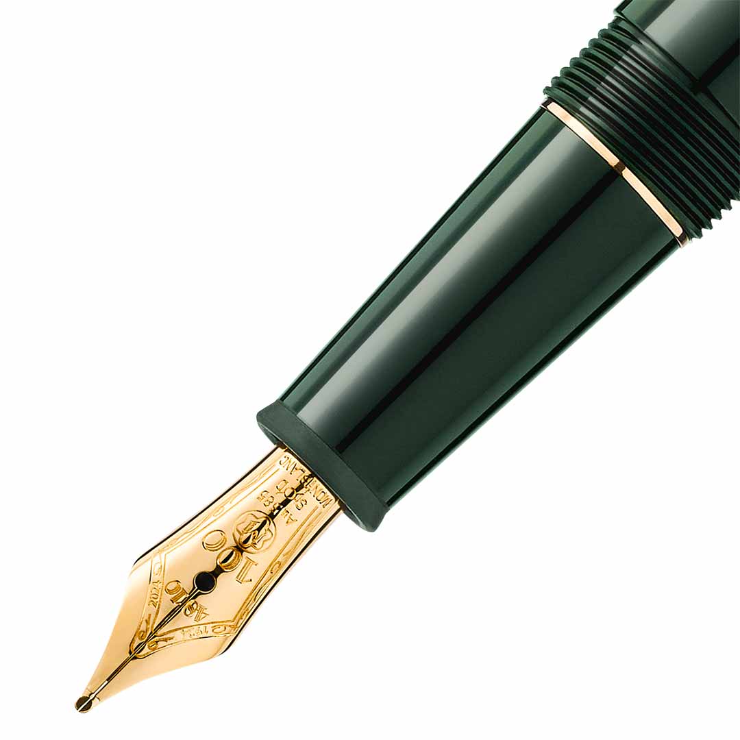 Close-up of the Montblanc Meisterstück The Origin Collection Precious Resin Fountain Pen Classique M, showcasing its glossy dark green barrel and gold nib. This fine writing instrument from Montblanc features intricate engravings on the nib that reflect light, accentuating its polished finish.
