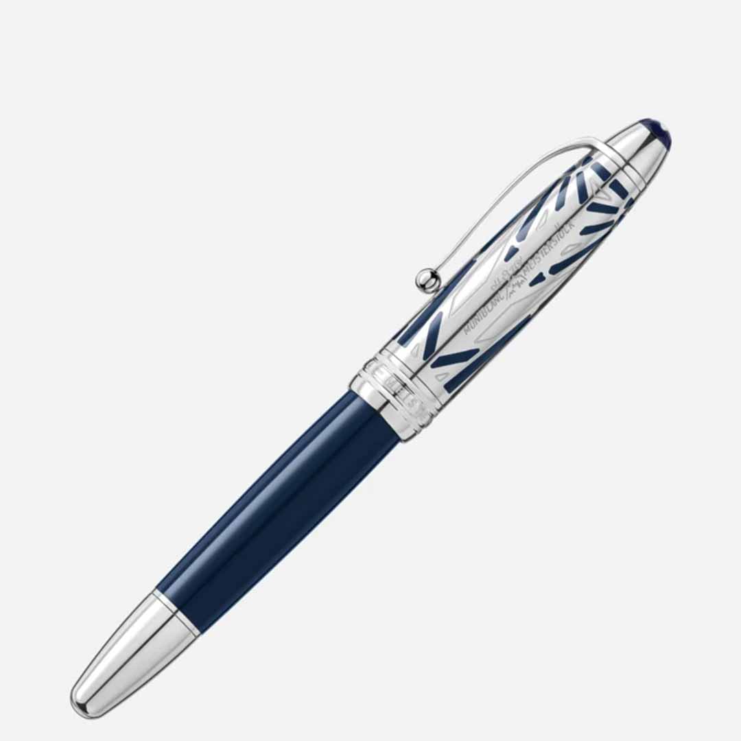A luxurious rollerball pen from the Montblanc Meisterstück The Origin Collection, named the Doue Le Grand, features a glossy navy blue body with silver accents and engraved patterns on the cap, set against a plain white background. This fine writing instrument epitomizes elegance and precision in every stroke.