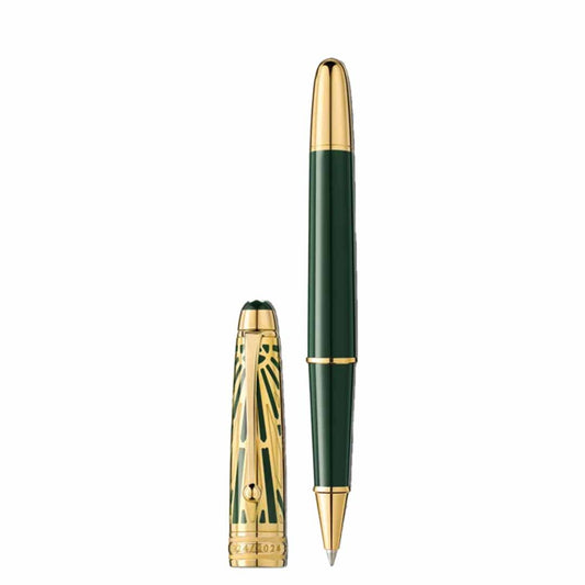 The Montblanc Meisterstück The Origin Collection Doue Classique Rollerball Pen is a sophisticated writing instrument featuring intricate gold patterns with green accents. Its sleek design includes an ornate, detachable cap and embodies the elegance of Art Déco style, standing upright to complement its refined aesthetic.