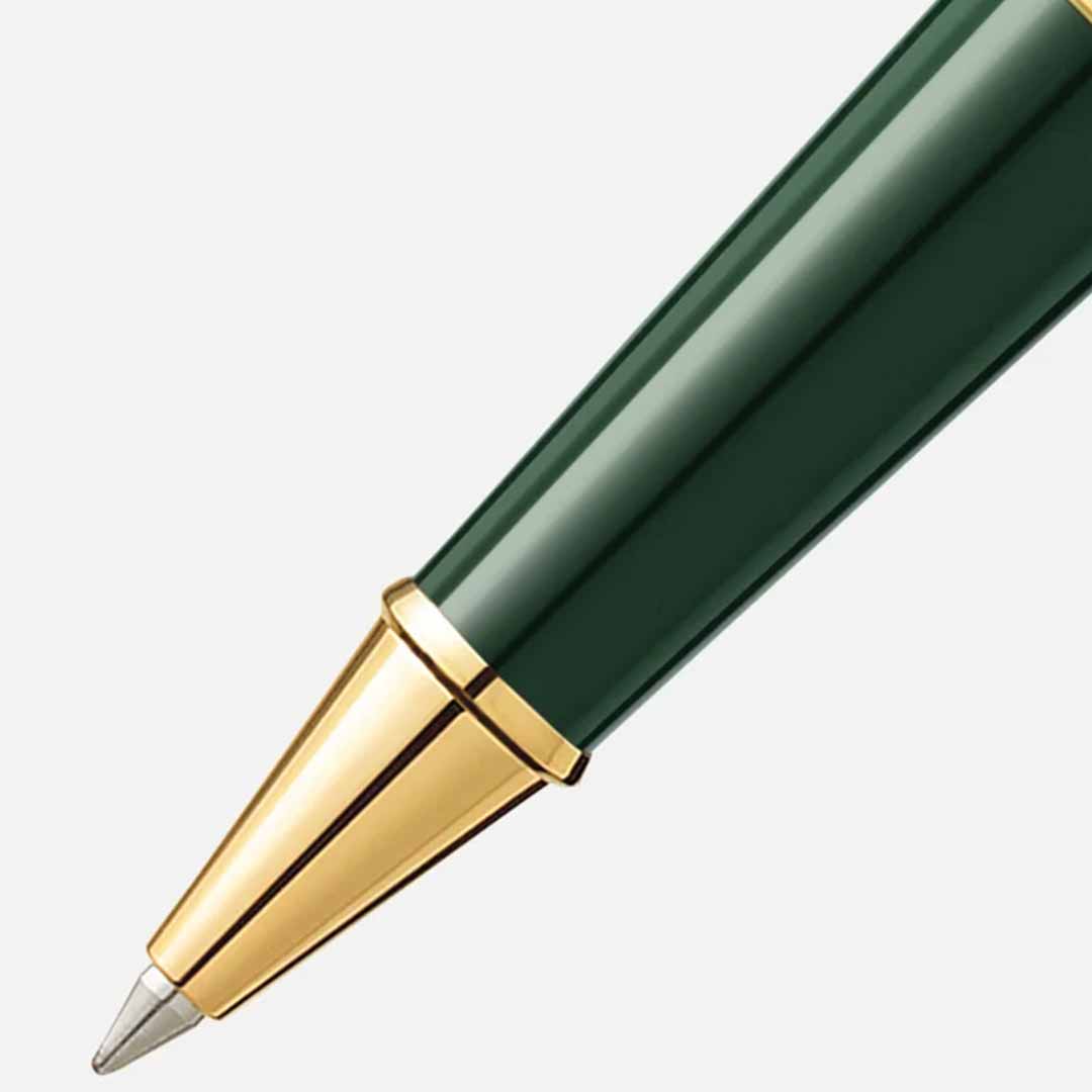 Close-up of the elegant green and gold Montblanc Meisterstuck The Origin Collection Doue Classique Rollerball Pen, featuring a gleaming metal tip against a light gray background, this exquisite writing instrument captures the essence of Art Déco design.