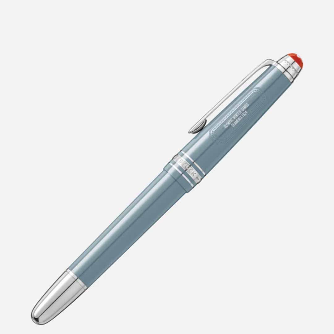 Introducing the Montblanc Meisterstück X Olympic Heritage Chamonix 1924 Classique Rollerball Pen, a stylish writing instrument featuring a light blue design with silver accents and a red tip, inspired by the 1924 Chamonix Olympic Games. This pen includes a convenient clip for attachment and is adorned with branded engraving on the barrel, commemorating the Meisterstück's centenary.
