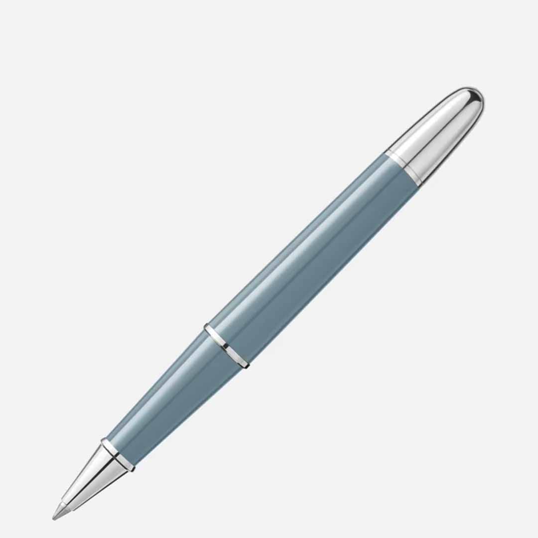 The Montblanc Meisterstuck X Olympic Heritage Chamonix 1924 Doue Classique Rollerball Pen, a sleek silver and teal writing instrument from Montblanc, features a shiny, reflective cap and tip, displayed against a plain white background.