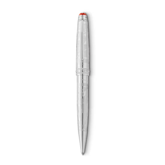 The Montblanc Meisterstück x Olympic Heritage Chamonix 1924 Solitaire Midsize Ballpoint, with its intricate silver patterns, stands vertically against a plain white background, exuding the sophistication of a Montblanc masterpiece. Its red tip provides a splash of color to the sleek design, embodying the elegance celebrated since the Olympic Games Chamonix 1924 and commemorating the Meisterstück centenary.