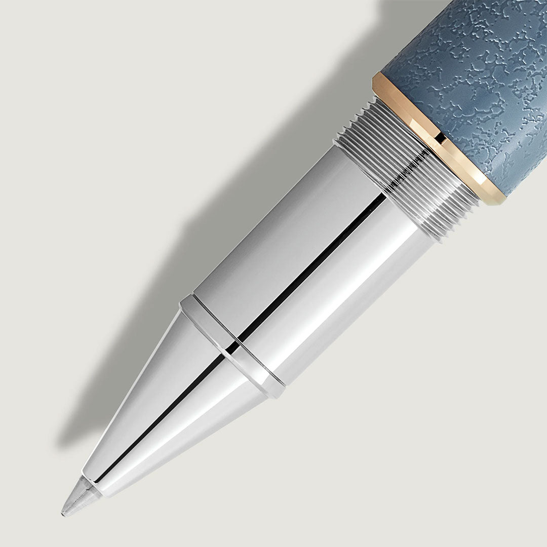 Close-up of the Montblanc Writers Edition Homage to Johann Wolfgang von Goethe Limited Edition Rollerball Pen, featuring a silver tip, textured blue grip, and gold accent ring—an elegant collector's item for admirers of German literature.