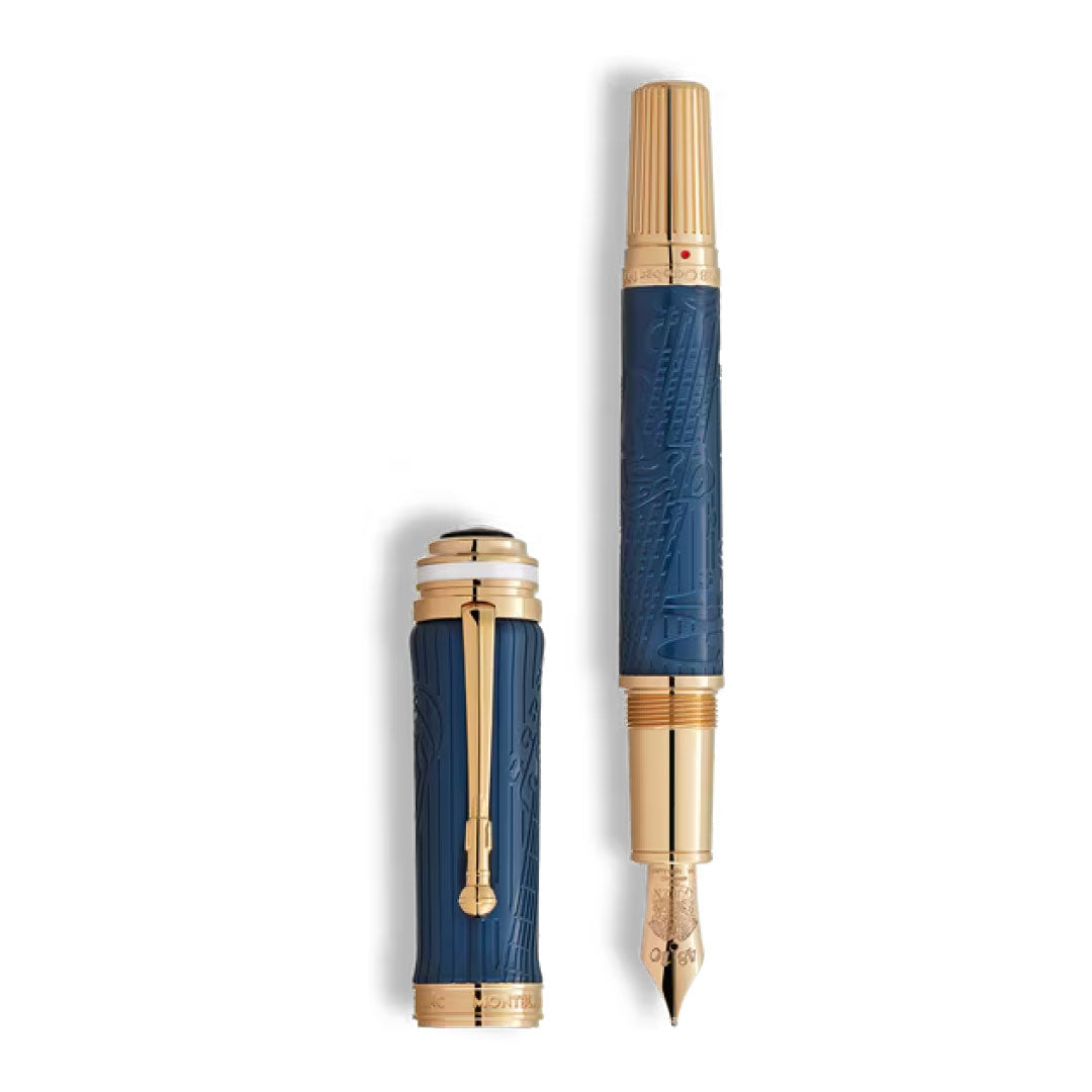 The Montblanc Great Characters Homage to Queen Special Edition Fountain Pen features a luxury blue design with gold accents, intricate engravings, and a gold nib—showcasing the brand’s renowned craftsmanship. Cap shown removed alongside the pen.