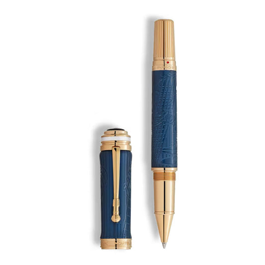 A Montblanc Great Characters Homage to Queen Special Edition Rollerball Pen in blue and gold with intricate engravings, displayed uncapped with the cap upright beside it on a white background.