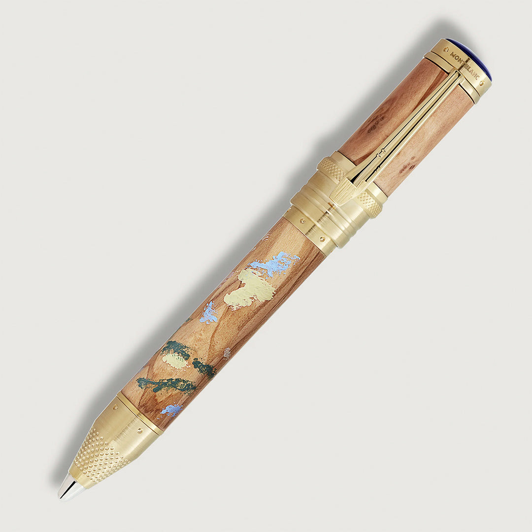 The Montblanc Masters of Art Homage to Pierre-Auguste Renoir Limited Edition 4810 Fountain Pen features a wooden barrel with gold, blue, and green accents inspired by Impressionism, gold trim, and textured grip on a plain light background.