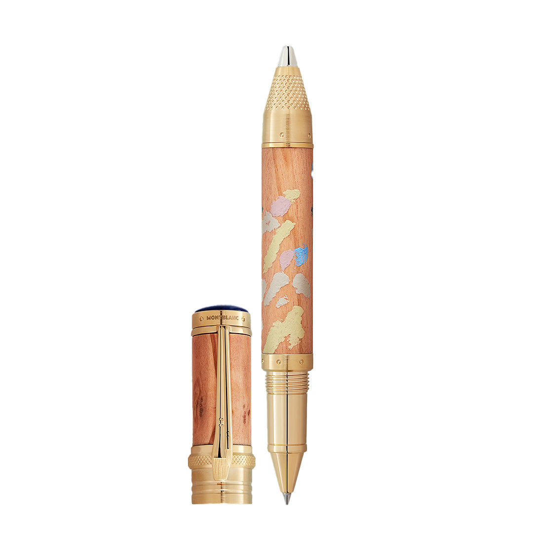 The Montblanc Masters of Art Homage to Pierre-Auguste Renoir Limited Edition 4810 Rollerball Pen features a gold-toned tip and intricately designed wood body. Part of the Masters of Art Collection, it embodies Impressionism with a matching gold clip and metallic, colorful accents.