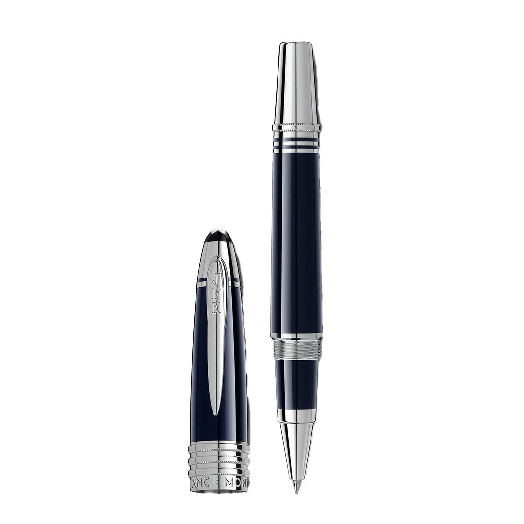 The Montblanc John F. Kennedy Special Edition Rollerball Pen, shown uncapped with its cap beside it, features dark blue and silver metallic accents for a shiny, elegant look.