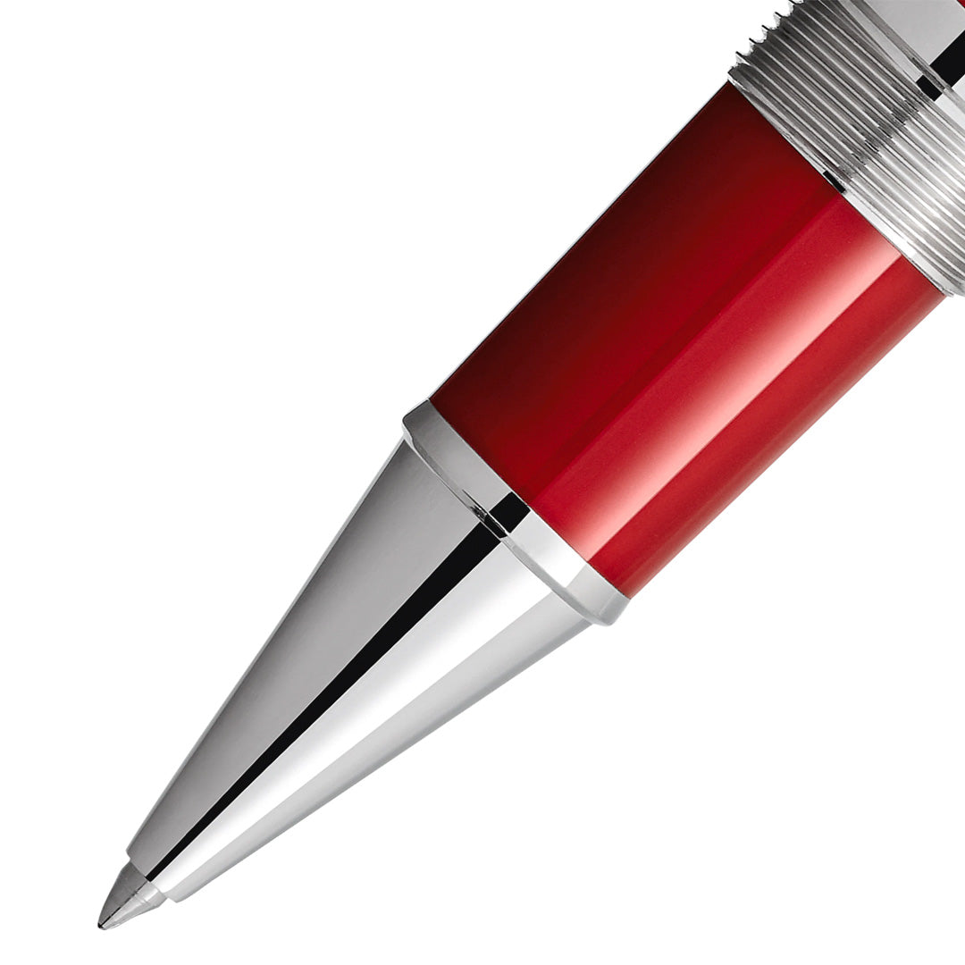 Close-up of the tip of a Montblanc Great Characters Enzo Ferrari Special Edition Rollerball Pen in red and silver, a luxury writing instrument by Montblanc honoring Scuderia Ferrari, isolated on a white background.