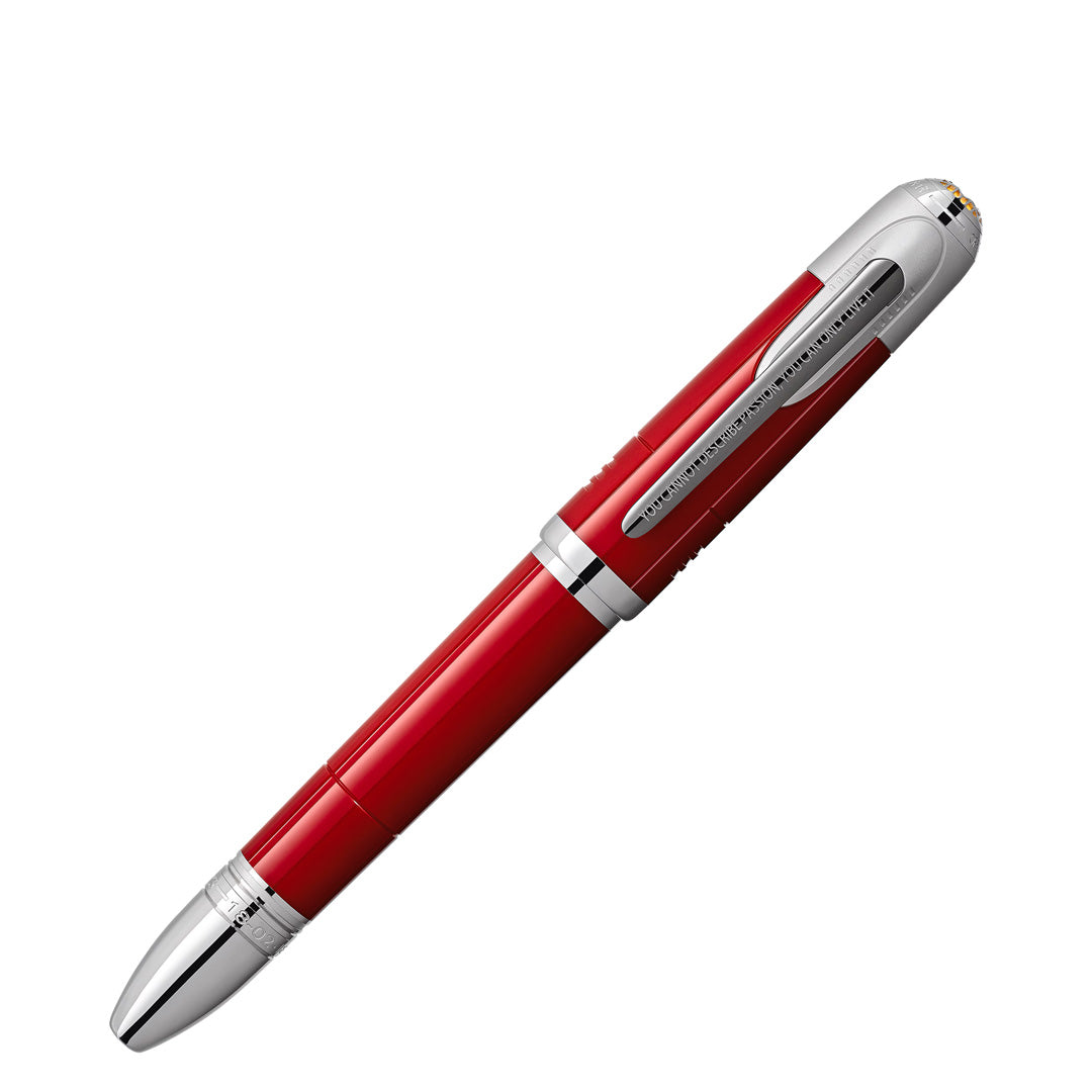 A Montblanc Great Characters Enzo Ferrari Special Edition Rollerball Pen with silver accents and a clip, presented diagonally against a white background, captures the allure of a luxury writing instrument.