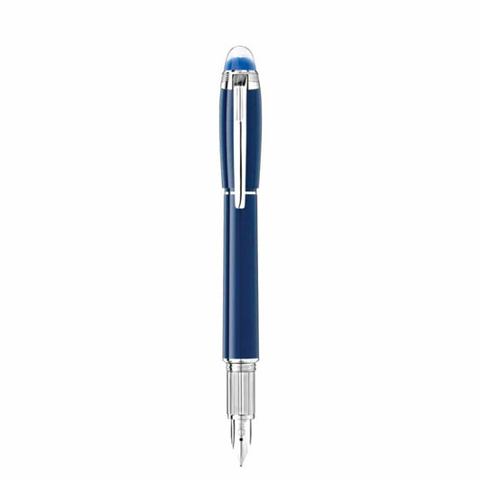 Standing upright against a white background, the Montblanc Starwalker Blue Planet Fountain Pen showcases a captivating blue and silver design, enhanced by its chrome clip and visible nib. This exquisite creation blends elegance with the adventurous spirit of space exploration.