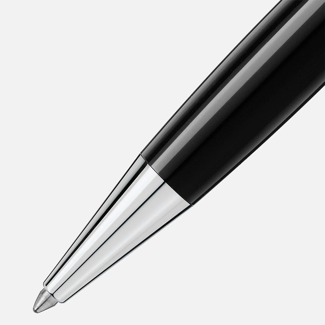 Close-up of the tip of a Montblanc Meisterstuck Platinum Coated Ballpoint Pen on a plain white background, highlighting the refined elegance synonymous with the Montblanc brand.