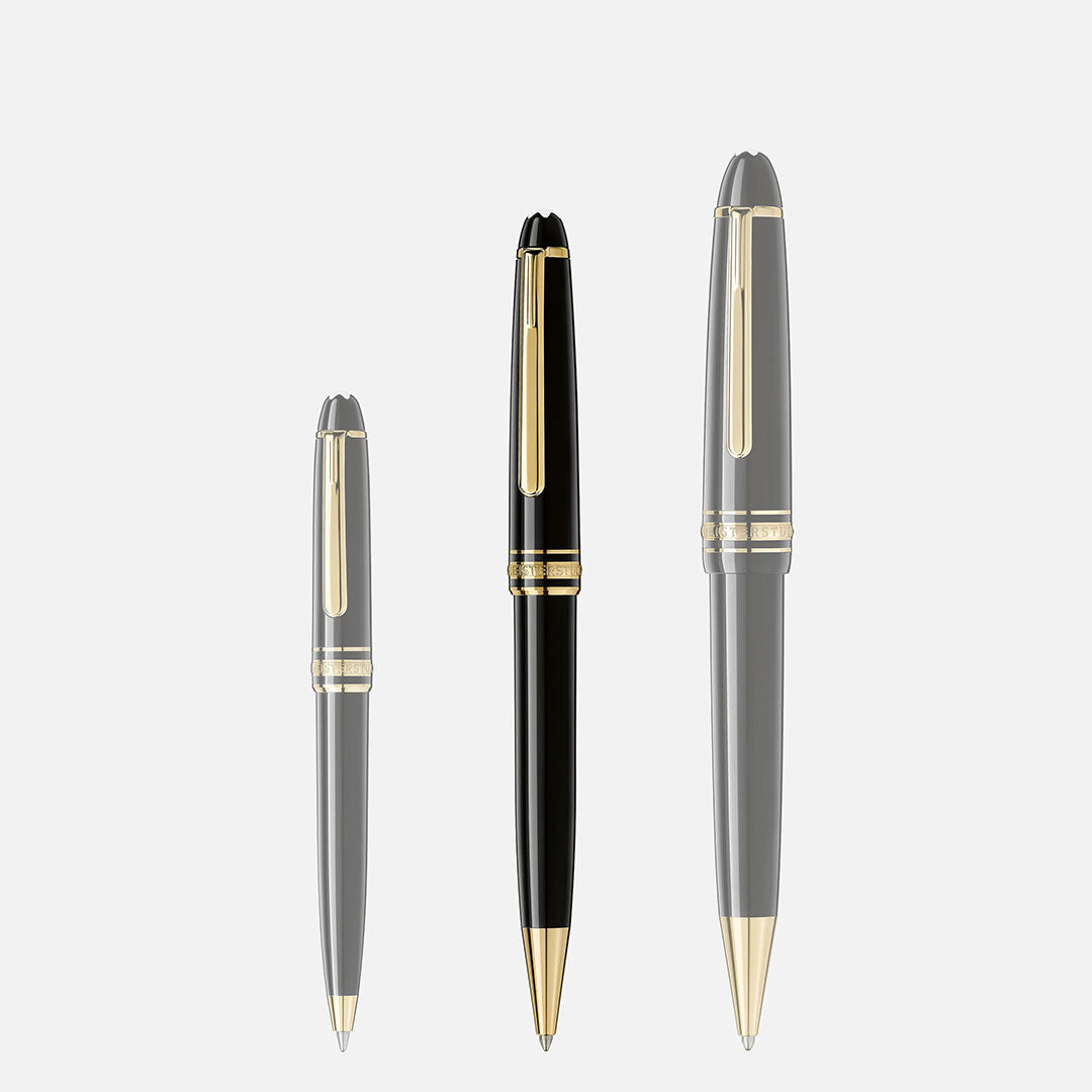 A Montblanc Meisterstück Yellow Gold Coated Ballpoint Pen is displayed on a plain white background, showcasing its elegant black precious resin and signature yellow gold-coated accents.
