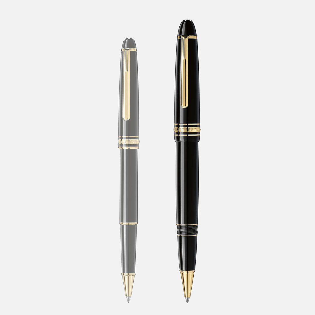 Two black Montblanc pens with gold accents are displayed side by side on a light background. The prominent pen on the right is the Montblanc Meisterstück Yellow Gold Coated LeGrand Rollerball Pen.