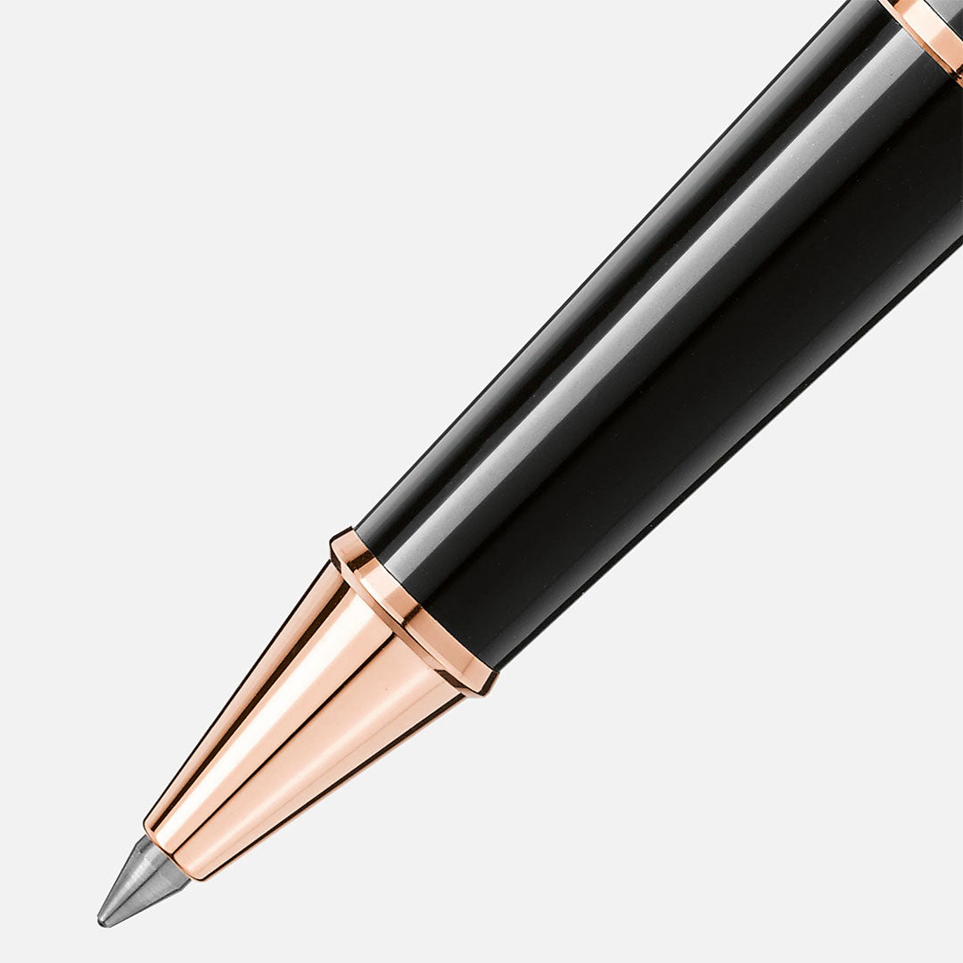 Close-up of the Montblanc Meisterstück Rose Gold Coated Rollerball Pen tip on a white background, highlighting the brand's exquisite craftsmanship for a premium writing experience.