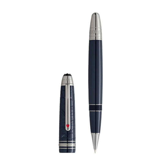 The Montblanc Meisterstück Around the World in 80 Days Legrand Rollerball Pen, elegantly crafted in dark blue precious resin with silver accents and a red emblem clip, stands vertically on a white background, echoing the adventurous spirit of its namesake.