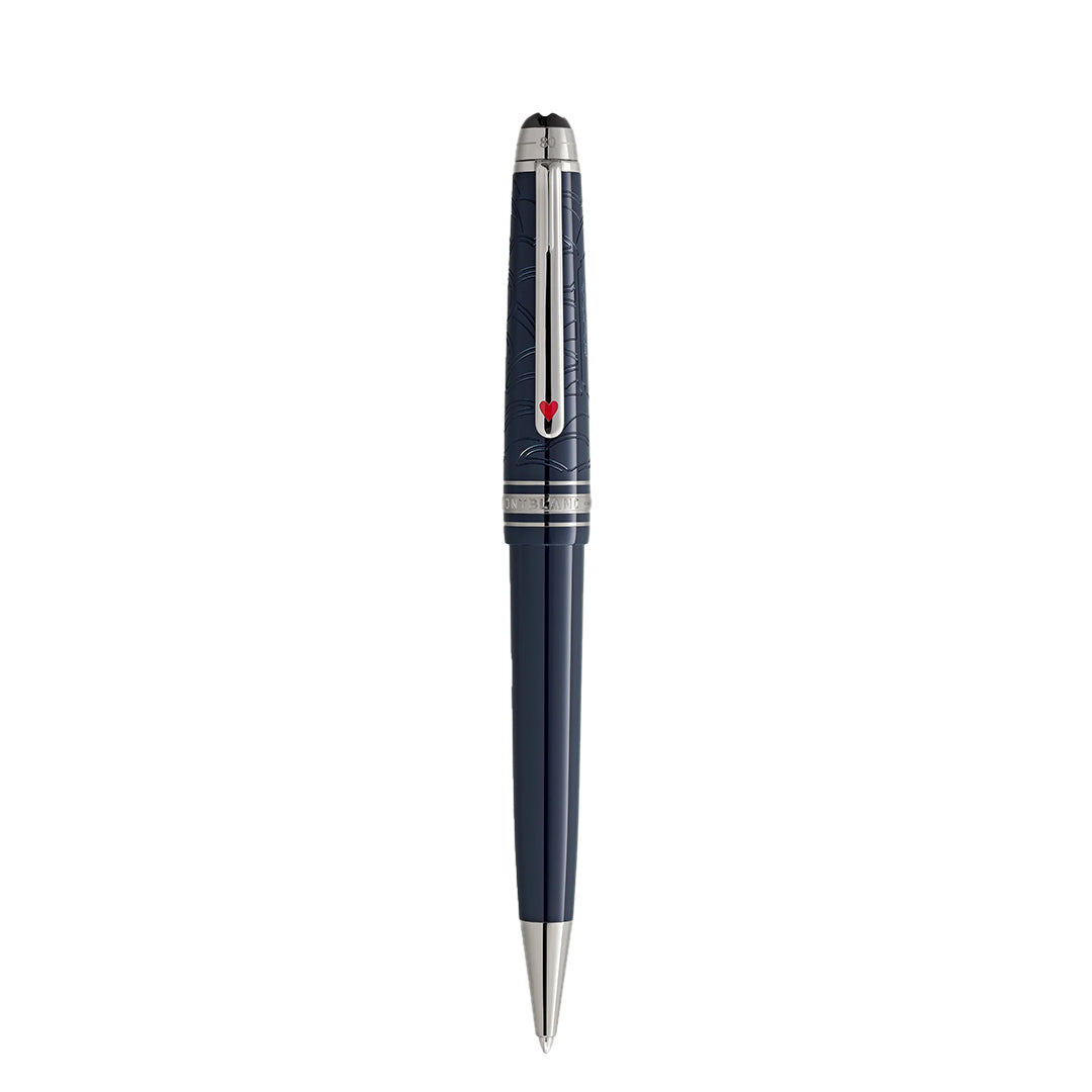 The Montblanc Meisterstück Around the World in 80 Days midsize ballpoint pen exudes adventure with its sleek dark blue body, silver accents, red arrow clip, intricate cap pattern, and shiny metallic tip.