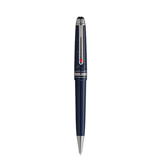 The Montblanc Meisterstück Around the World in 80 Days Classique Ballpoint Pen features a blue and silver design with engraved barrel patterns. It has a sleek elegance and a silver clip with a red accent, akin to an item Jules Verne could have cherished.