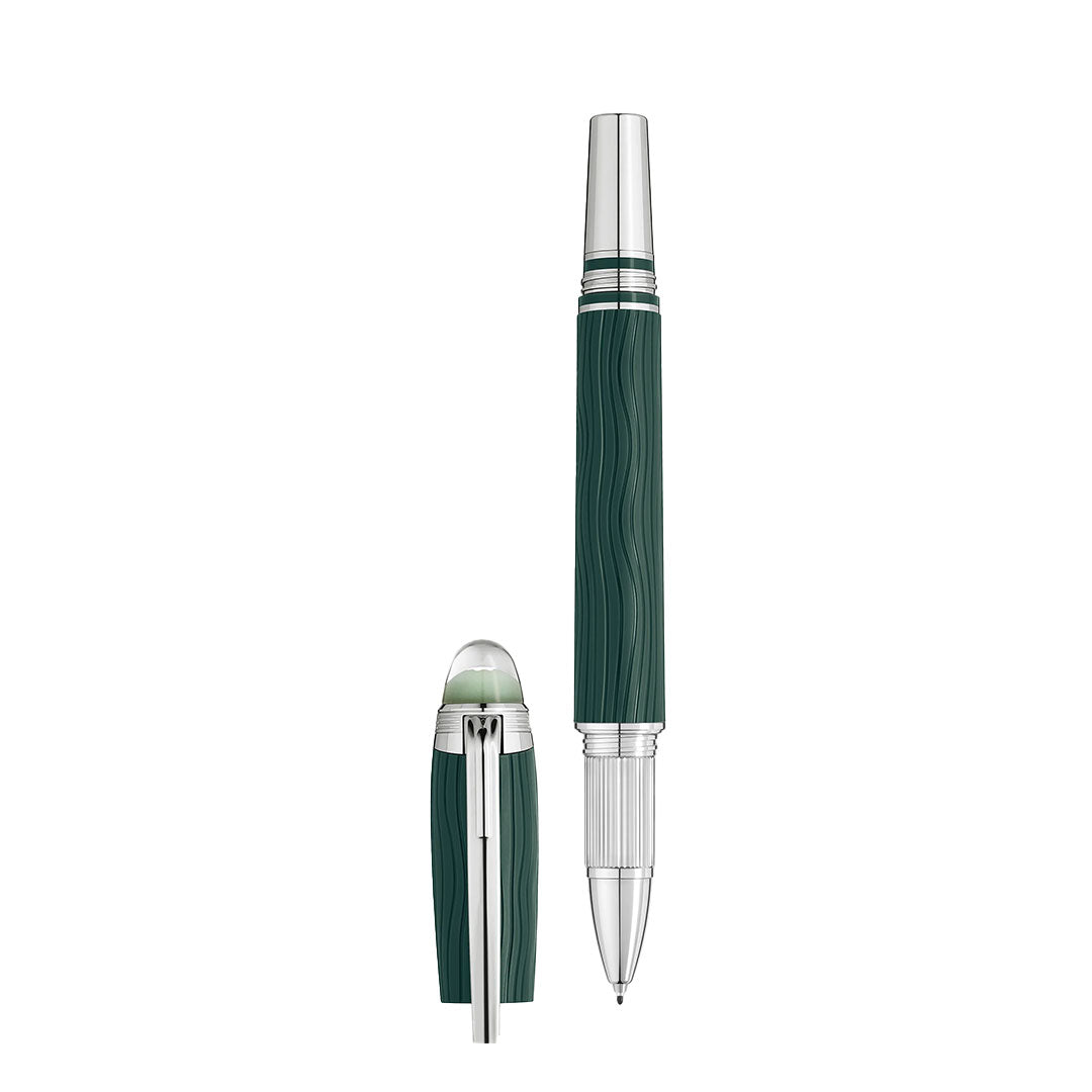 The Montblanc Starwalker Polar Green Precious Resin Fineliner Pen features a green and silver design with textured vertical lines. Shown uncapped, its pen tip is visible beside the upright silver-capped cap with a shiny clip.